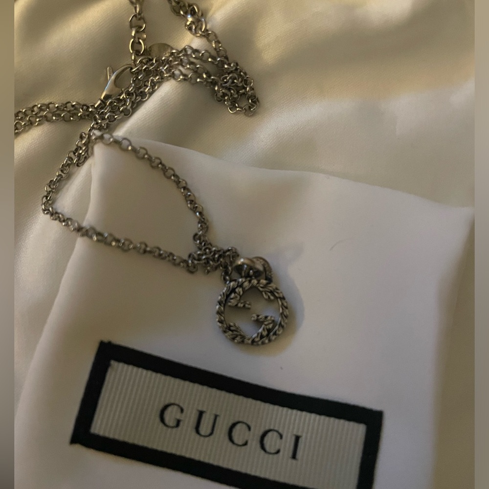 Interlocking double G necklace, never worn